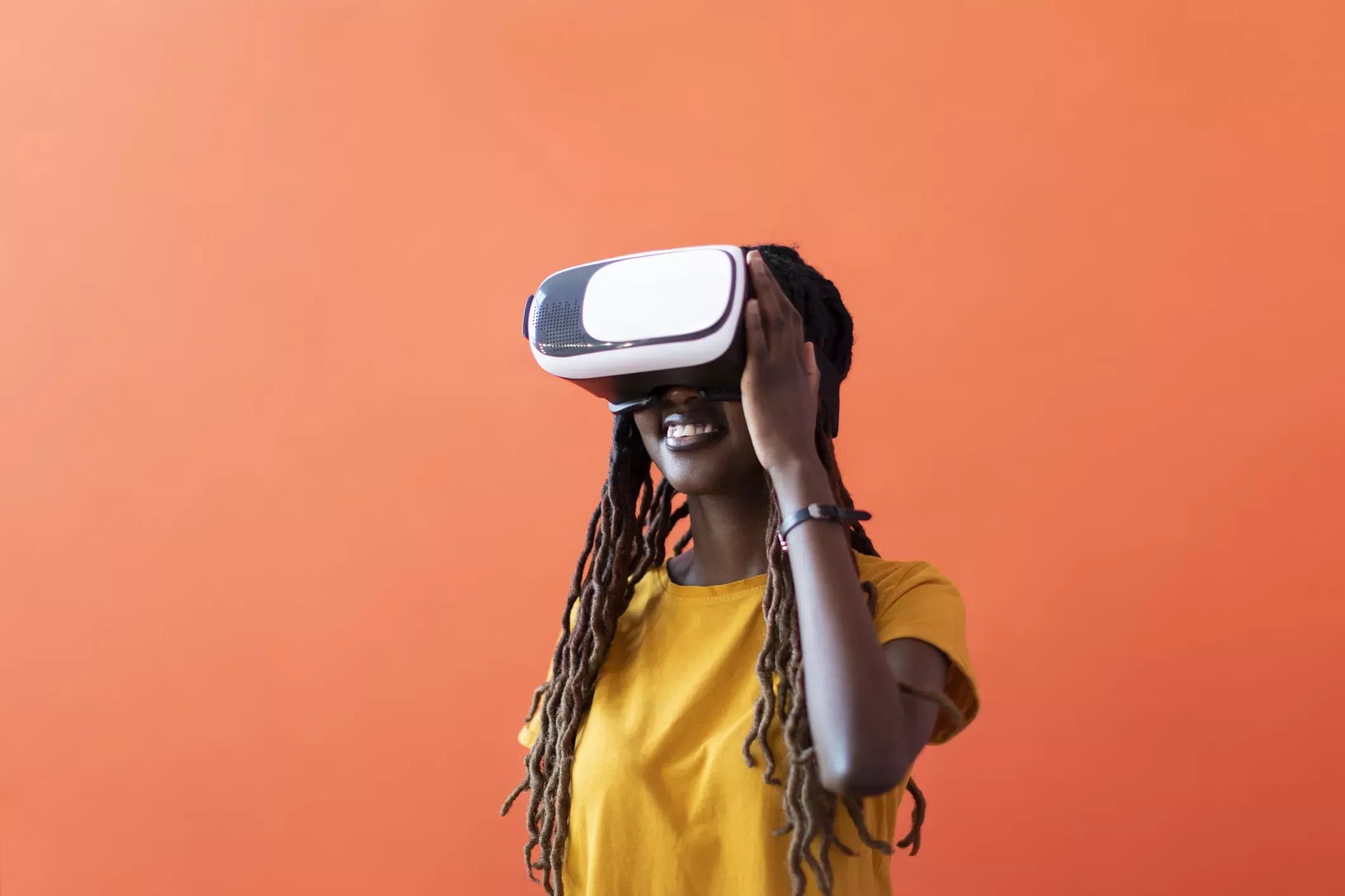Woman uses VR headset with fiber internet